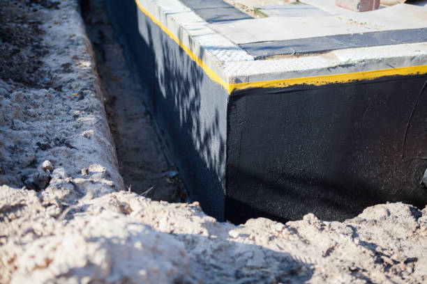 Professional Exterior Waterproofing technician working in Paris Crossing, IN